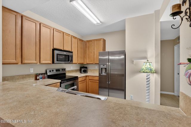 2200 MARSH HAWK Lane 403, Fleming Island, FL 32003