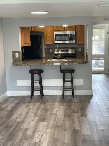 5932 PEREGRINE AVENUE 22D, Orlando, FL 32819