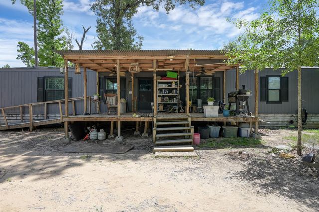 400 Raven Hill Road, Oakhurst, TX 77359
