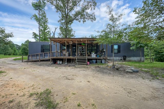 400 Raven Hill Road, Oakhurst, TX 77359