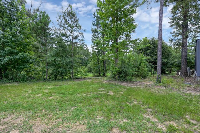 400 Raven Hill Road, Oakhurst, TX 77359