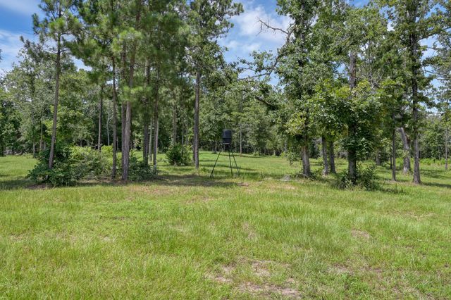 400 Raven Hill Road, Oakhurst, TX 77359