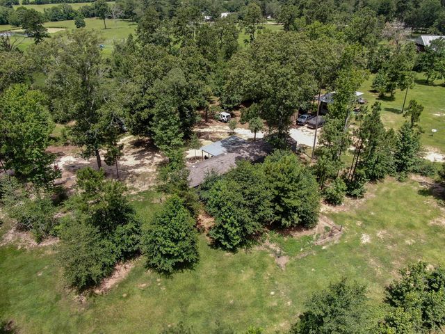 400 Raven Hill Road, Oakhurst, TX 77359