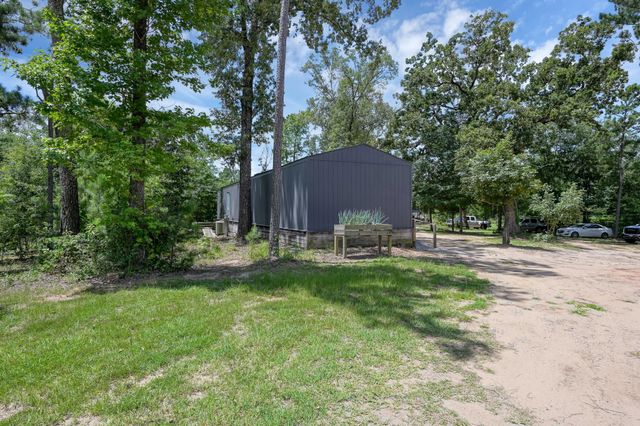 400 Raven Hill Road, Oakhurst, TX 77359