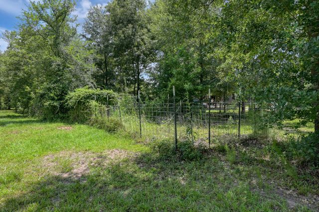 400 Raven Hill Road, Oakhurst, TX 77359