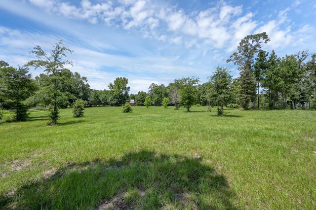 400 Raven Hill Road, Oakhurst, TX 77359