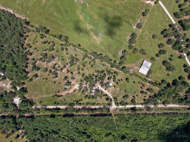 400 Raven Hill Road, Oakhurst, TX 77359