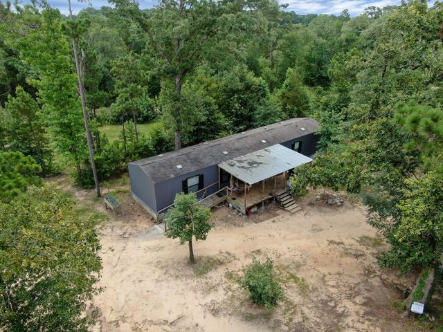 400 Raven Hill Road, Oakhurst, TX 77359