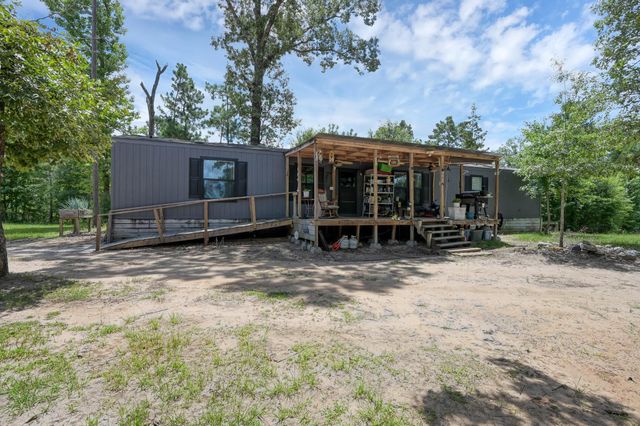 400 Raven Hill Road, Oakhurst, TX 77359