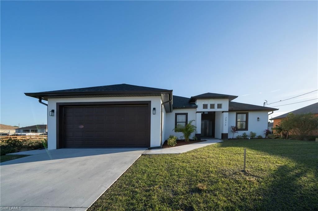 2915 5th ST SW, LEHIGH ACRES, FL 33976 — photo 2