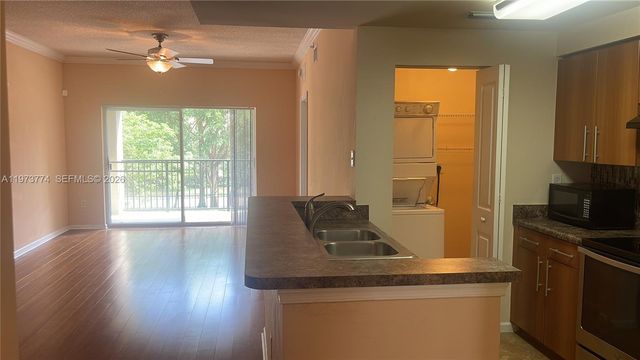 6020 W Sample Rd 207, Coral Springs, FL 33067