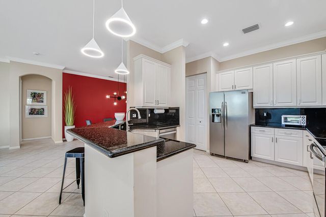 7727 Ocean Sunset Drive, Lake Worth, FL 33467