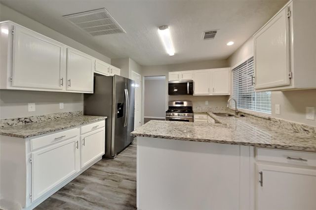 9322 Bayou Bluff Drive, Spring, TX 77379