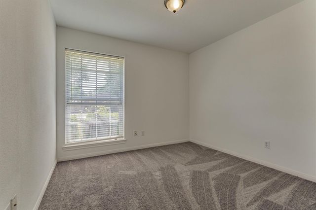 9749 E Shore Drive, Willis, TX 77318