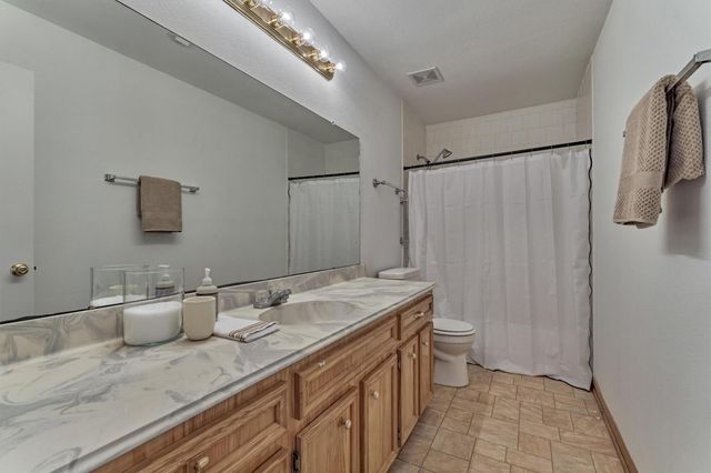 9749 E Shore Drive, Willis, TX 77318