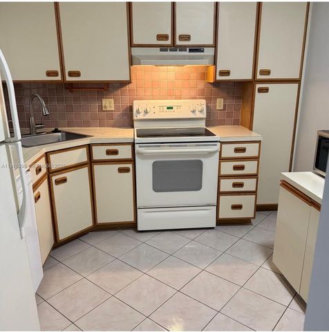 2590 N Carambola Cir N 1877, Coconut Creek, FL 33066