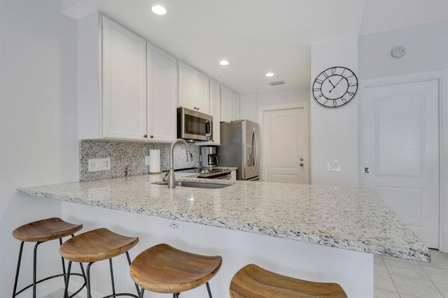 73 Laurel Oaks Circle, Jupiter, FL 33469