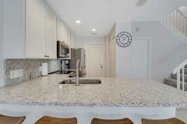 73 Laurel Oaks Circle, Jupiter, FL 33469