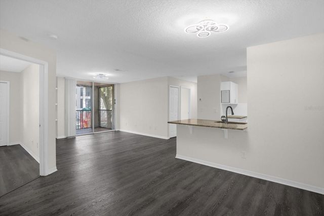 7606 PISSARRO DRIVE 14204, Orlando, FL 32819