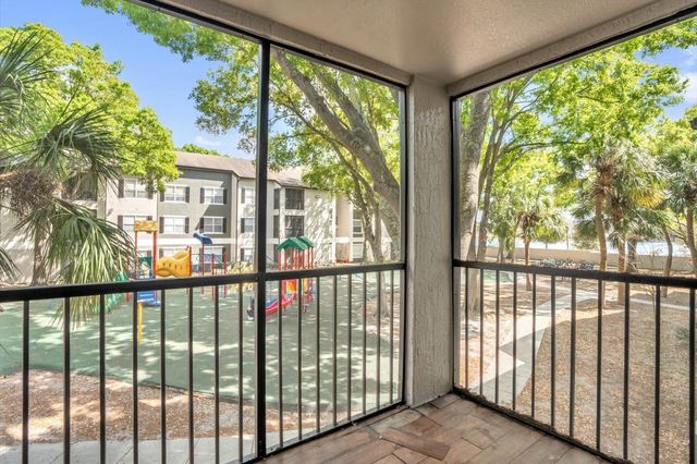 7606 PISSARRO DRIVE 14204, Orlando, FL 32819