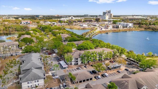 7606 PISSARRO DRIVE 14204, Orlando, FL 32819