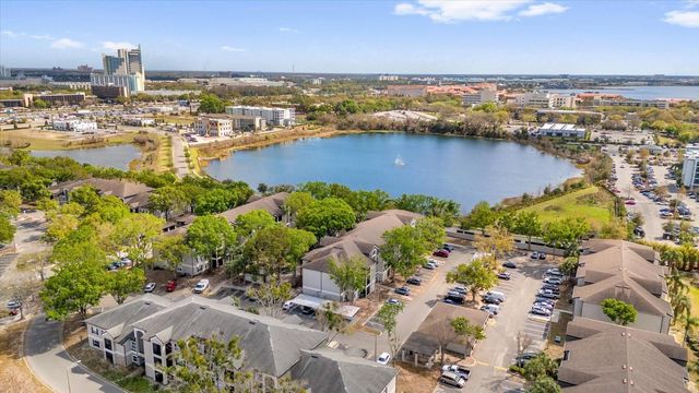 7606 PISSARRO DRIVE 14204, Orlando, FL 32819