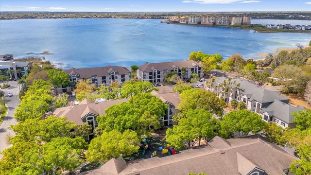 7606 PISSARRO DRIVE 14204, Orlando, FL 32819