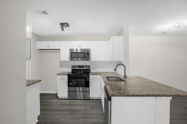 7606 PISSARRO DRIVE 14204, Orlando, FL 32819