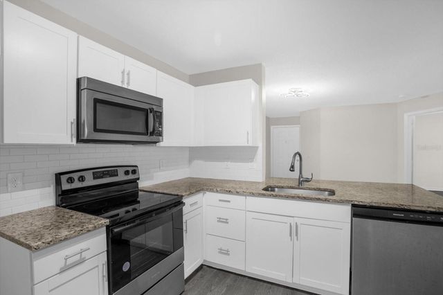 7606 PISSARRO DRIVE 14204, Orlando, FL 32819