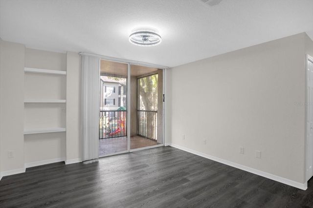 7606 PISSARRO DRIVE 14204, Orlando, FL 32819