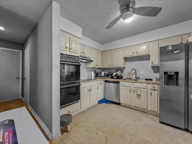 8411 Oak Stream Drive, Dallas, TX 75243