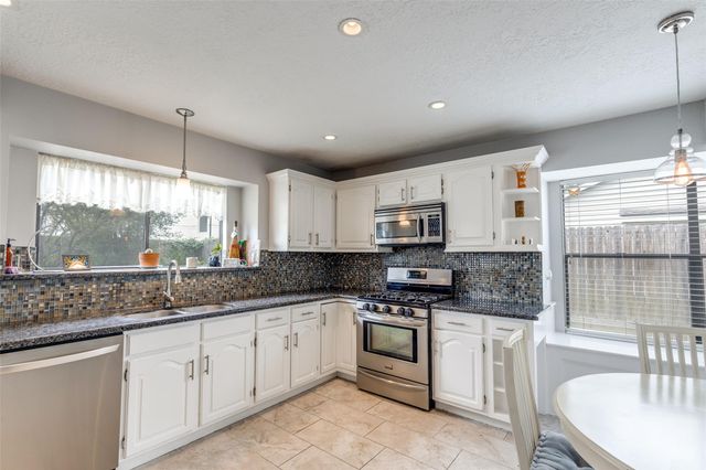 12407 Ravens Mate Drive, Cypress, TX 77429