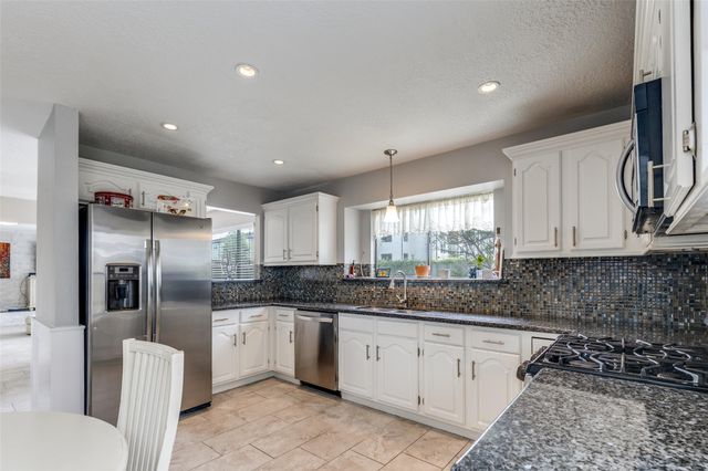 12407 Ravens Mate Drive, Cypress, TX 77429