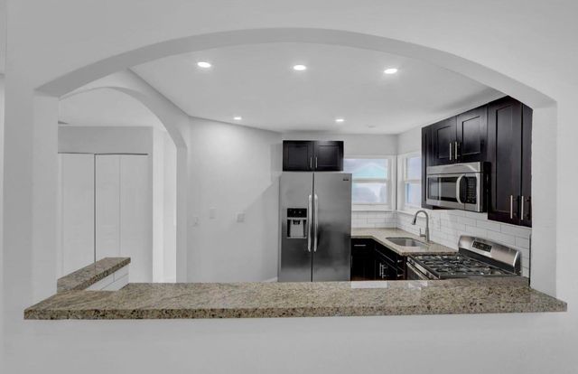 1413 Blue Clover Lane, West Palm Beach, FL 33415