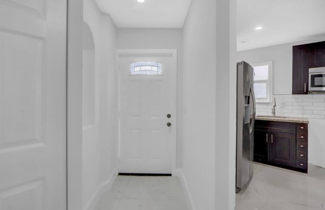 1413 Blue Clover Lane, West Palm Beach, FL 33415