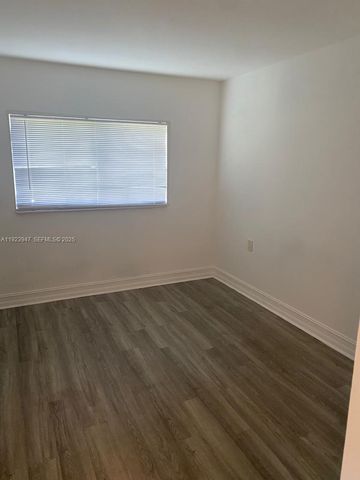 1089 N Benoist Farms Rd 107, West Palm Beach, FL 33411