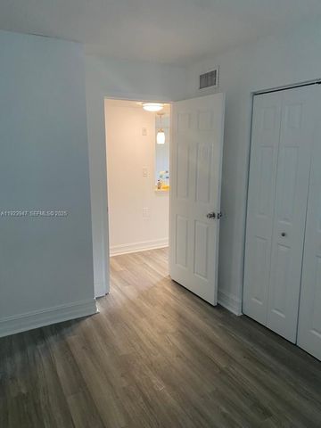 1089 N Benoist Farms Rd 107, West Palm Beach, FL 33411