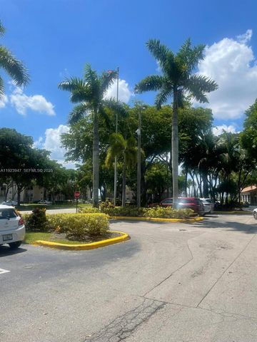 1089 N Benoist Farms Rd 107, West Palm Beach, FL 33411