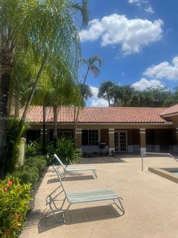 1089 N Benoist Farms Rd 107, West Palm Beach, FL 33411