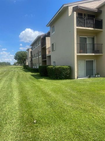 1089 N Benoist Farms Rd 107, West Palm Beach, FL 33411