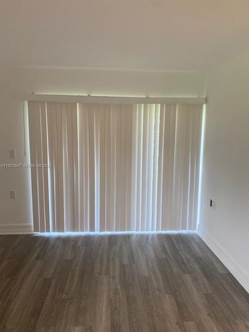 1089 N Benoist Farms Rd 107, West Palm Beach, FL 33411