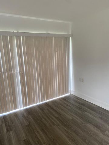 1089 N Benoist Farms Rd 107, West Palm Beach, FL 33411