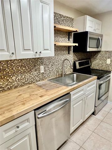 1631 NW 46th Ave 119, Lauderhill, FL 33313