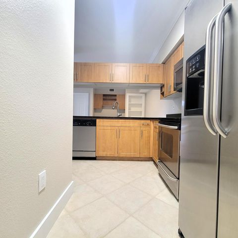 6418 EMERALD DUNES Drive 201, West Palm Beach, FL 33411