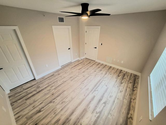 6418 EMERALD DUNES Drive 201, West Palm Beach, FL 33411
