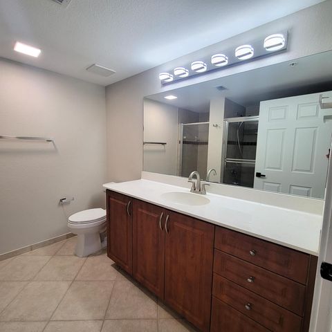 6418 EMERALD DUNES Drive 201, West Palm Beach, FL 33411