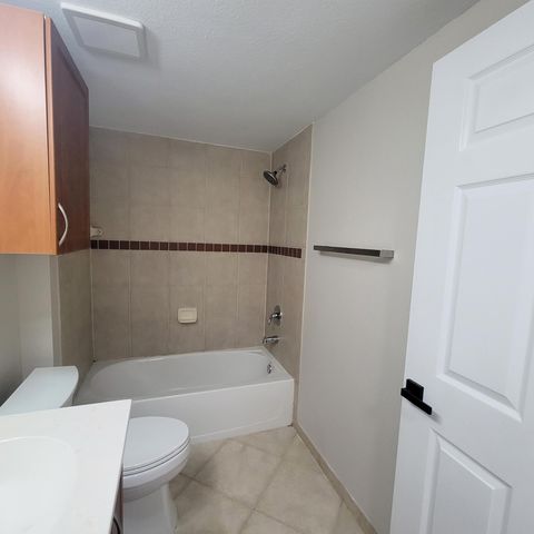 6418 EMERALD DUNES Drive 201, West Palm Beach, FL 33411