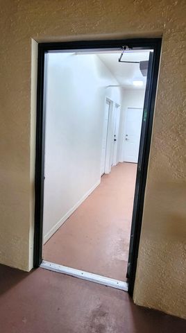 6418 EMERALD DUNES Drive 201, West Palm Beach, FL 33411