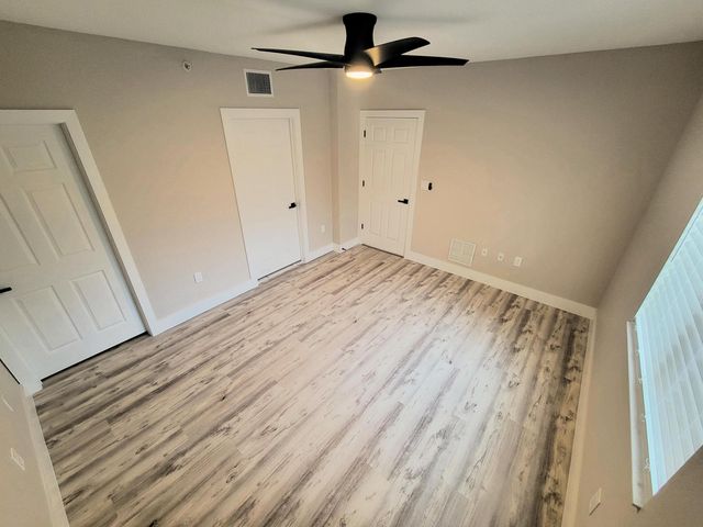 6418 EMERALD DUNES Drive 201, West Palm Beach, FL 33411