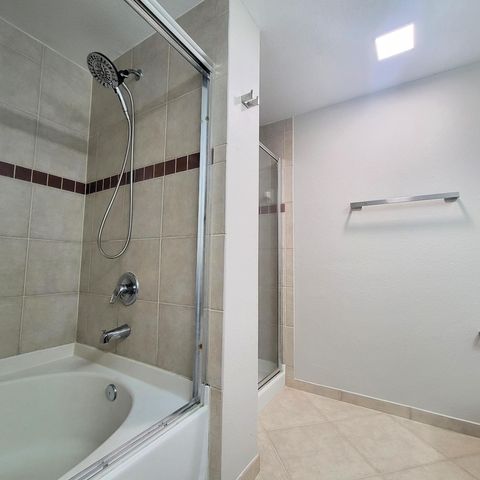 6418 EMERALD DUNES Drive 201, West Palm Beach, FL 33411